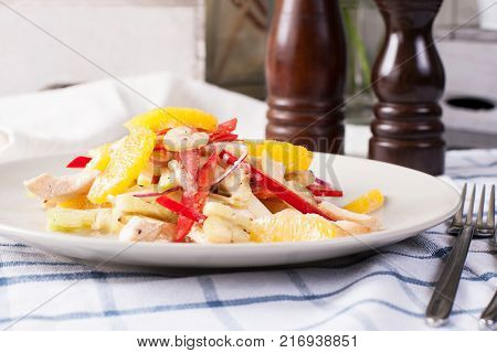 Chicken salad with fruits and vegetables. Stock images.