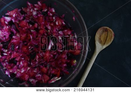 Cup with a salad of vegetables and mainly beetroot called salad