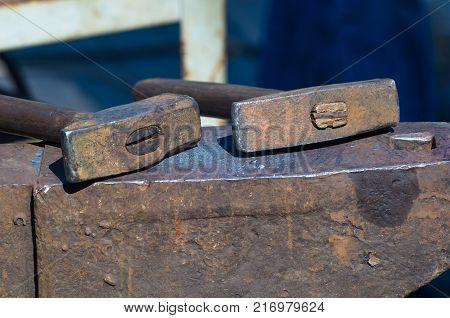 blacksmith tools and fixtures for hand forged metal, close-up