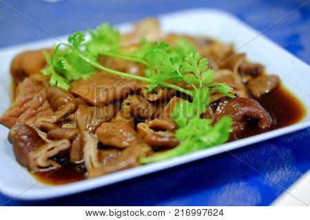 Pork chitterlings in the sweet gravy Thai cuisine.