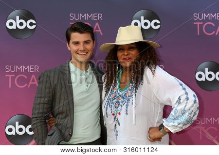 LOS ANGELES - AUG 15:  JT Neal, Pam Grier at the ABC Summer TCA All-Star Party at the SOHO House on August 15, 2019 in West Hollywood, CA