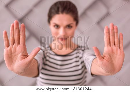 Young Woman Saying Stop With Her Gesture