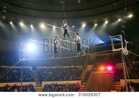 The Tightrope Walkers At The Circus Arena.