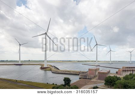 Krammer Wind Farm And Western Entrance Krammer Lock Complex Between The Fresh Water Of The Volkerak 