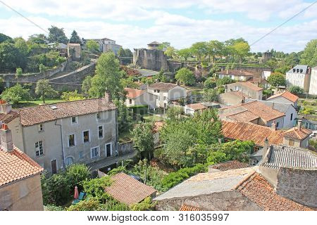 Tiled Roofs Of Parthenay From The Castle, France