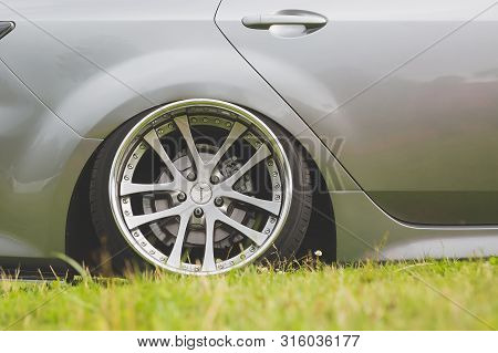 Moscow, Russia - July 13, 2019: Lowered Silver Colored Tuned Mazda 6 Is Parked On The Grass. Kranze 