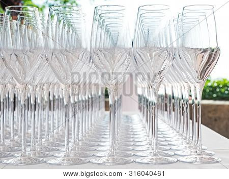 Big Amount Of Empty Champagne Glasses On The Table Close-up