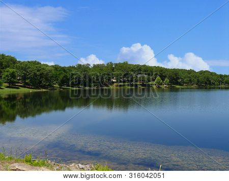 Scenic Refreshing View Of A Lake At Chickasaw National Recreation Area In Davis, Oklahoma