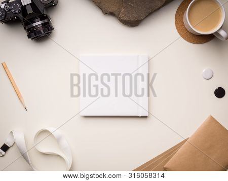 Book Back Cover Template On A Clean Background With Pencil, Camera, Envelopes, Pins And Cup Of Coffe