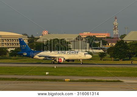 Passenger Airplane At Bangkok Airport