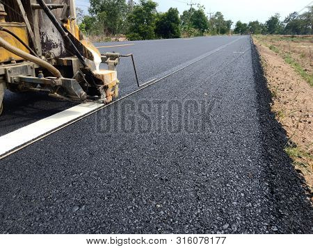 Road Traffic Paint On The Asphalt Surface And To Ensure Safety