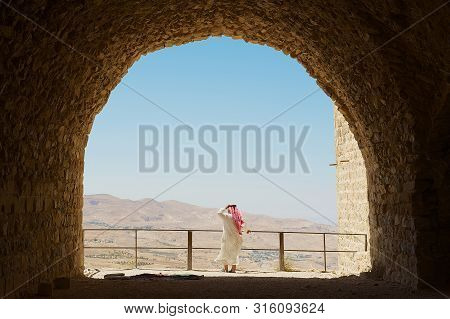 Karak, Jordan - August 22, 2012: Tourist Visits Medieval Crusaders Castle In Al Karak, Jordan. One O
