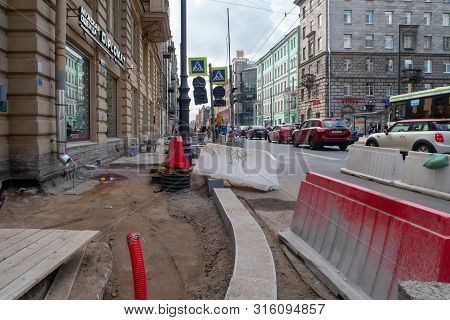 St. Petersburg, Russia - August 08, 2019: Repair Of Sidewalks On Bolshoi Prospect Of The Petrograd S