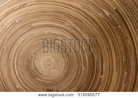 Texture Of Wooden Bowl Seen From Top Down.
