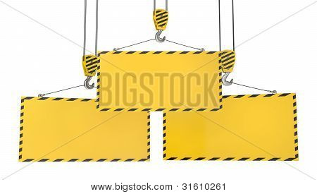 Tre gru ganci con piastre gialli vuoti