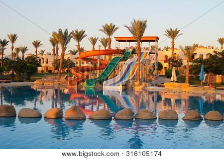 Sharm-el-sheikh/egypt - 06/21/2019. Water Colorful Rainbow Slides With Swimming Pool In The Hotel At