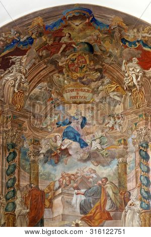 SAMOBOR, CROATIA - MARCH 03, 2018: Assumption of the Virgin Mary, altar fresco in the Church of the Assumption of the Virgin Mary in Samobor, Croatia