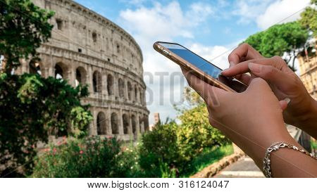 Close Up Of Aboriginal Hand Using Smartphone And Dressed A Traditional Clothes Of The Tribe. Taiwane