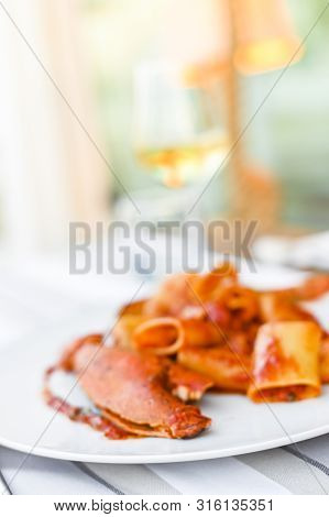 Pasta With Spiny Lobster And Tomato Sauce. Seafood Lunch At The Restaurant And A Glass Of White Wine