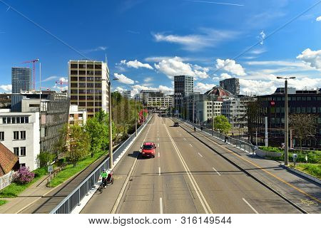 Basel, Switzerland - April 17, 2019. View From The Pedestrian Bridge To The Modern Neighborhood Of B