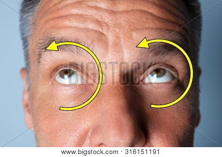 Man Doing Shifting Eye Exercise To Improve Vision