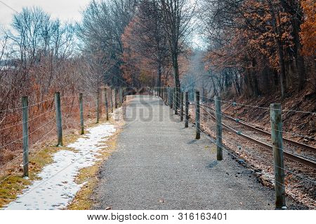 Hiking Trail Running Alongside The Railroad Tracks