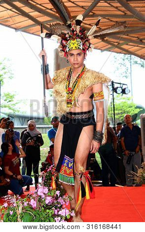 Selangor, Malaysia - August 04, 2019:   Iban Traditional Dance Performer From Sarawak Tribe During T