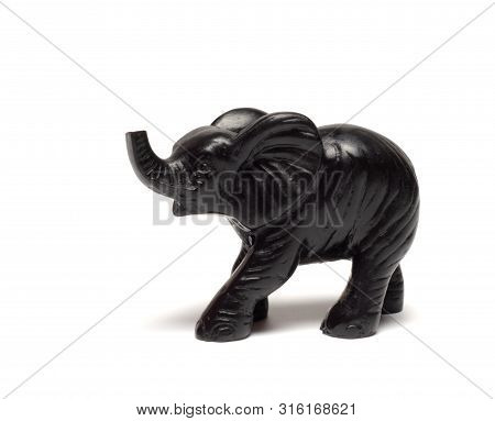Black Elephant Figurine On A White Background