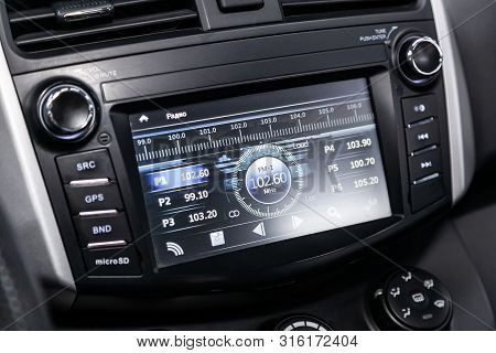 Novosibirsk, Russia - July 30, 2019: Lifan X60, Car Control Pane Monitor L Of Audio Player And Other