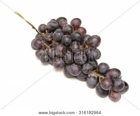 Bunch Of Grapes Lies On A White Background