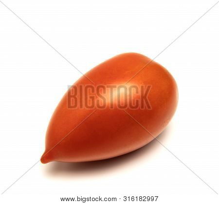 Red And Ripe Tomato Lies On A White Background