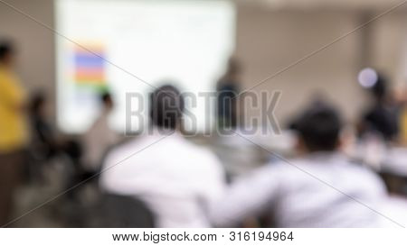 Office Meeting Blur Background With Business People Working Group In Boardroom Discussion For Teamwo