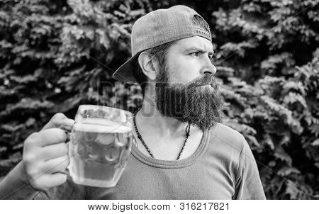 Drinking Culture. Hipster Holding Beer Mug. Bearded Hipster Drinking Beer On Summer Nature. Hipster 