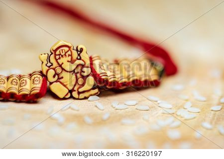 Lord Ganesha Handmade Wristband With Rice Grains For Ritual Purpose. Indian Rakshabandhan Festival B