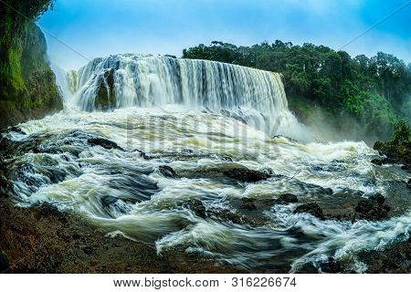 The Powerful Of Sae Pong Lai Waterfall In Southern Laos.