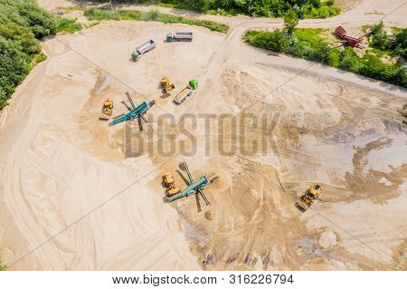 Aerial View Of Sandpit And Factory Plant Producing Sand Materials For Construction Industry. Top Vie