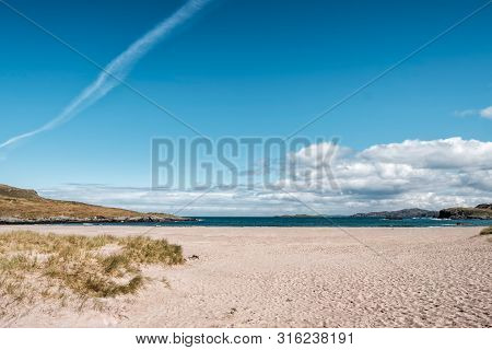 View Over The Beach And Bay At Clashnessie On The North West Coast Of The Scottish Highlands