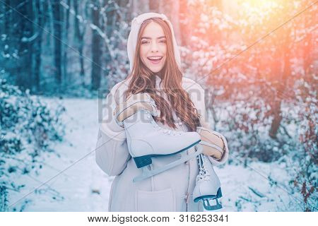 Winter Girl Playing With Snow In Park. Women On Mountain. Beautiful Girl In The Winter Forest In Whi