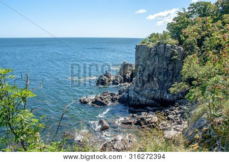 The Rocks Off The Coast Of Bornholm. A Piece Of Rough Nature