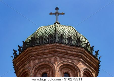 Bucharest, Romania - July 11, 2019: The Cupola With Cross Of The Front Tower Of The Church Of The An