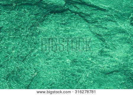 Vintage Green Background. Rough Painted Wall Of Emerald Color. Imperfect Plane Of Virid Colored. Une