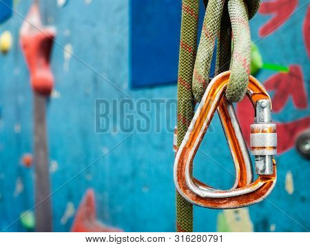 Carabiner For Climbing. Durable Metal Carabiner And Rope For Exercise. Climbing Wall