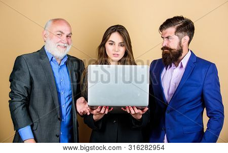 Discussing Progress. Expert Team. Business Meeting. Men Bearded Manager Show Financial Report Laptop