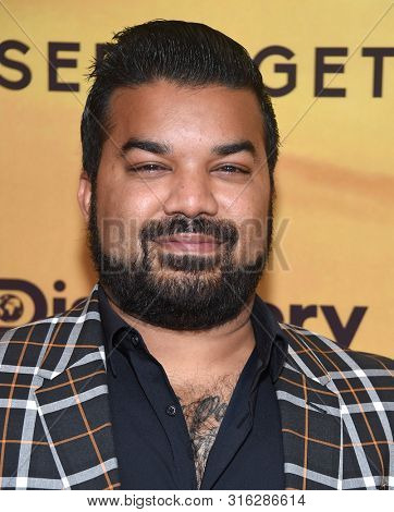 LOS ANGELES - JUL 23:  Adrian Dev arrives for the 'Serengeti' Special Screening on July 23, 2019 in Beverly Hills, CA                