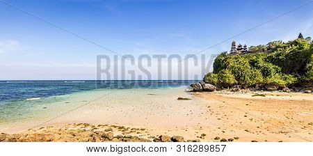 Traditional Pura Temple On A Cliff At Geger Beach On Bali Island, Indonesia