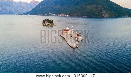 Aerial View Of Small Islands Of Ostrvo And Sveti Juraj Monastery In The Bay Of Kotor, Montenegro
