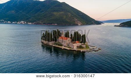 Aerial View Of Small Islands Of Ostrvo And Sveti Juraj Monastery In The Bay Of Kotor, Montenegro
