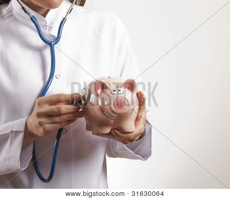 의사와 핑크 돼지 저금통