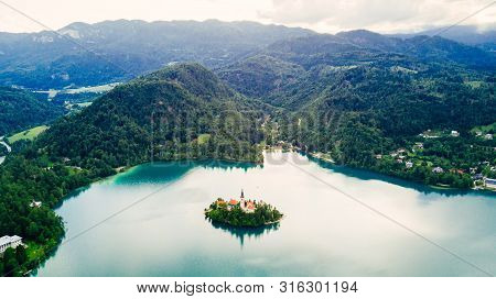 Bled, Slovenia. Aerial Drone View Of Lake Bled With The Pilgrimage Church Of The Assumption Of Maria