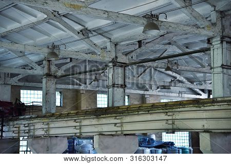 Old Empty Destroyed And Abandoned Factory. Industrial Concept